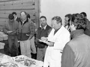 Bygones Prints: Auctioneer Arthur THomas conducting business at Brixham fishmarket in the 1980s