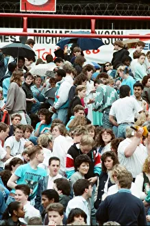 Audience gather outside the Wembley arena prior to the Michael Jackson concert