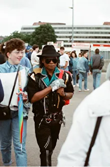 Audience gather outside the Wembley arena prior to the Michael Jackson concert