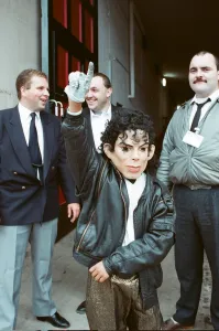 Audience gather outside the Wembley arena prior to the Michael Jackson concert