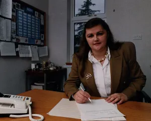 Portra Prints: Audrey Baxter of Baxters Food mustard jacket white blouse pen papers
