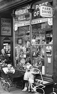 August 1961. Children wait outside the Post Office in Waterloo Street, Hull