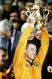 00004 Prints: Austalian rugby captain Nick Farr-Jones holding aloft the Rugby Union World Cup