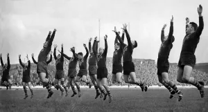 00059 Prints: Australia Rugby League tourists stretching before playing their game