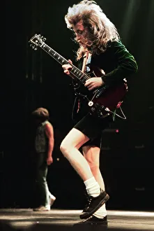 Ac Dc Prints: Australian rock group AC / DC performing on stage at Wembley Arena during their