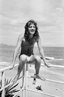 South America Prints: Australian rock group AC / DC take time to relax at Ipanema beach in Rio De Janeiro