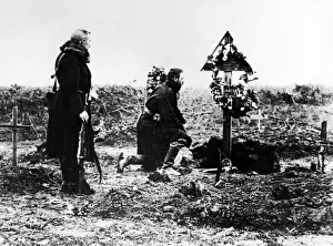 Balkans Prints: Austrian Officer pay tribute to a fallen officers grave