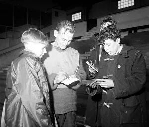 00238 Prints: Autograph hunters were quickly on the scene and all eager for Manchester