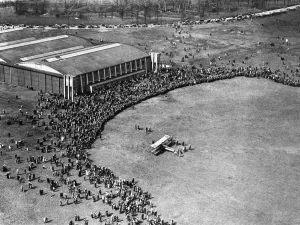 Early Prints: An Avro 504K three seater bi plane draws a huge crowds as it makes a landing at Alexandra