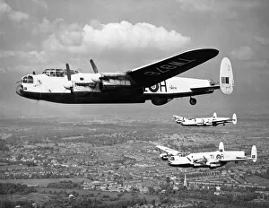 An Avro Lancaster bomber from 35 Squadron in flight over the English countryside
