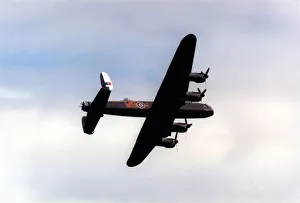 Air Display Prints: An Avro Lancaster bomber aircraft of the Battle of Britain Memorial Flight flies past