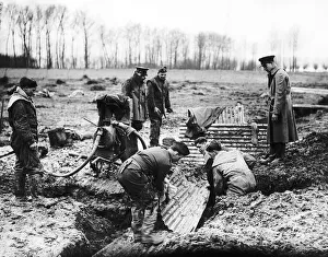 B Company Royal Irish Fusiliers constructing trenches with corrigated iron