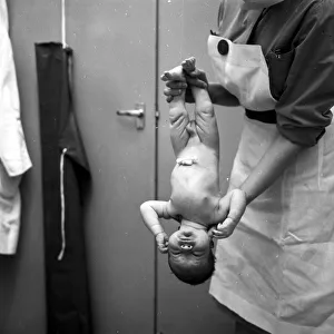 Baby boy seen here just after birth at Plaistow Maternity Hospital. He weighed 9lbs 7oz