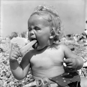 Baby and Lolly. Derorah Ann Clowes 13 months from Stoke on treat enjoys herself in