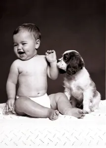 Baby Prints: Baby Sophie O Donnell with Jackson, the King Charles Spaniel October