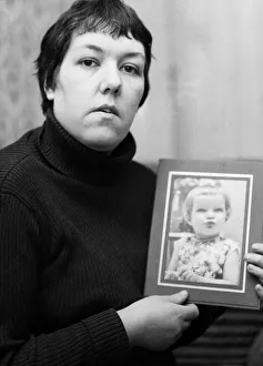 Pregnancy Prints: Baby Stephanie Higgins (shown on photograph) died on a operating table