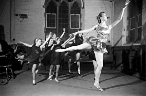 Ballet dancer Maureen Gardner gives instructions to children during one of her classes