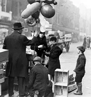 Street Traders Prints: The balloon man was doing a roaring trade in the centre of Newcastle on 21st December