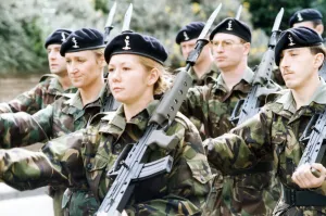 The band leads the way as the 34th Signal Regiment parades through the centre of