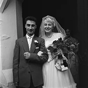 Bandleader Roy Kenton, 25, marries 18-year-old singer of the band Jean Barry at St
