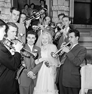 01390 Prints: Bandleader Roy Kenton, 25, marries 18-year-old singer of the band Jean Barry at St