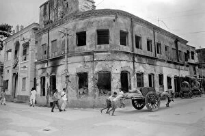 00175 Collection: Bangladesh War of Independence 1971 The burnt out shell of a Rick Shaw factory in