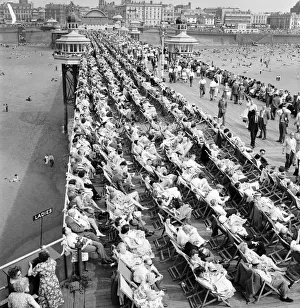 Bank holiday at Blackpool. Beach scenes / crowds / sunbathing. June 1960 M4319-014