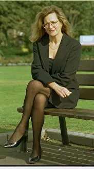 Barbara Dickson wearing glasses and a black suit poses in Largs