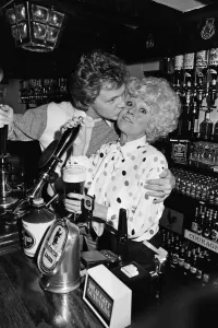 Business Prints: Barbara Windsor and her boyfriend Steve Hollings celebrate in their new pub