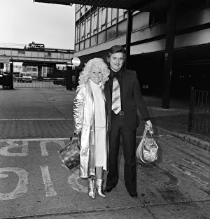 Barbara Windsor and her husband Ronnie Knight arriving at Heathrow Airport from Australia