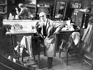 Chair Prints: Barber John Armbruster in his olde worlde barber shop in Coronation Street
