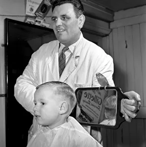 Barber Shop Humour: Mr. Jim Reid with Billy the Budgie seen here at the barber shop