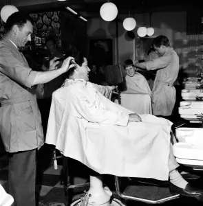 Barber Shop: Michael Holliday having hair cut at Ronnies of Streatham