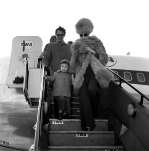 01127 Prints: Barbra Streisand arrives at Heathrow Airport with her son Jason Gould