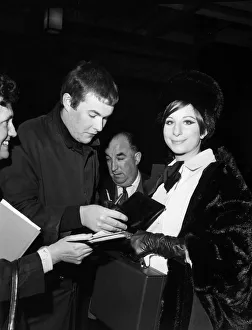 Barbra Streisand arriving at Londons Savoy hotel she signed several autographs