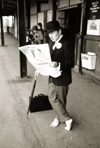 Bowler Hat Prints: Barefoot City Gent Peter Greenwood shoeless to advertise the new Walt Disney called