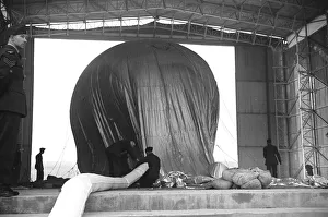 00080 Prints: Barrage Balloon being filled in its hangar at Hook, Surrey. October 1938