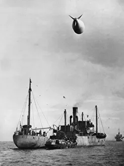 Convoy Prints: Barrage balloons for merchant ships 31st October 1941 Balloons being transferred