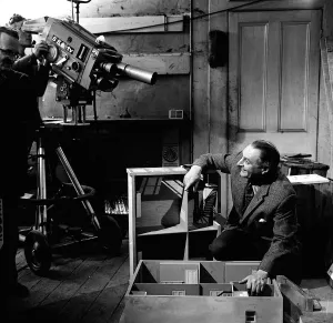 Barry Bucknell DIY TV Presenter - April 1962 showing off plan off house