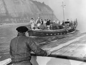 The Barry Dock lifeboat searches for the missing crew members of a tug