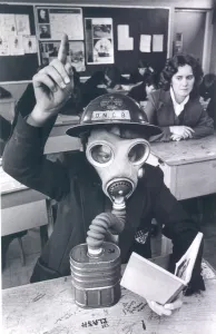 Barry Ingham of Ashington High School wearing a World War Two gas mask, March 27, 1981