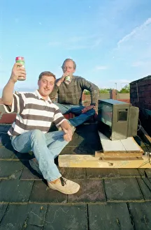 Barry Kirkham and his mate Kevin sitting on a roof top tuning in to the England v West