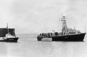 The Barry lifeboat and the Royal Navy Auxiliary ship Odiman escorts the small craft