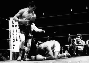 Barry McGuigan April 1988 Boxer standing over Nicky Perez after punching flooring him