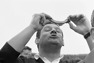 00099 Prints: Barry Pavan TV Advertising producer seen here about to enjoy a pork rib at the Sunday