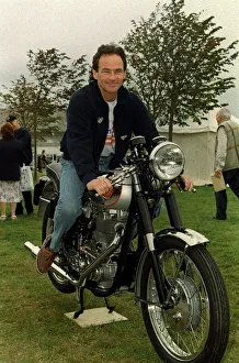 Rider Prints: Barry Sheene September 1998. Former world motorcycle champion sitting on an old