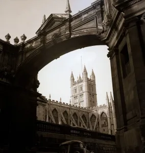 Worship Prints: Bath Abbey viewed through the cloisters archway Religion Architecture