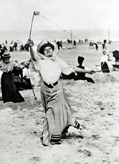 Old Fashion Prints: Bathers on holiday playing Diavolo on the beach Edwardian Beach clothing - long