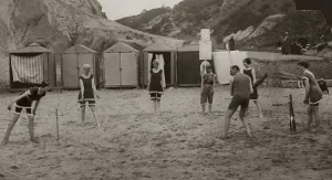 Bathers play cricket on the sands at Bournemouth September 1915