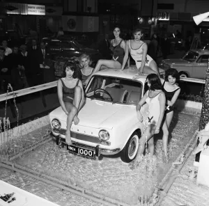 Bathing beauties with the new Simca 1000 in display fountains at the Earls Court Motor